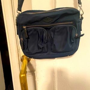 Tan suede shoulder bag/attached purse.